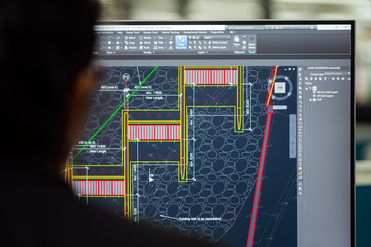 Parametric CAD model open on a workstation display