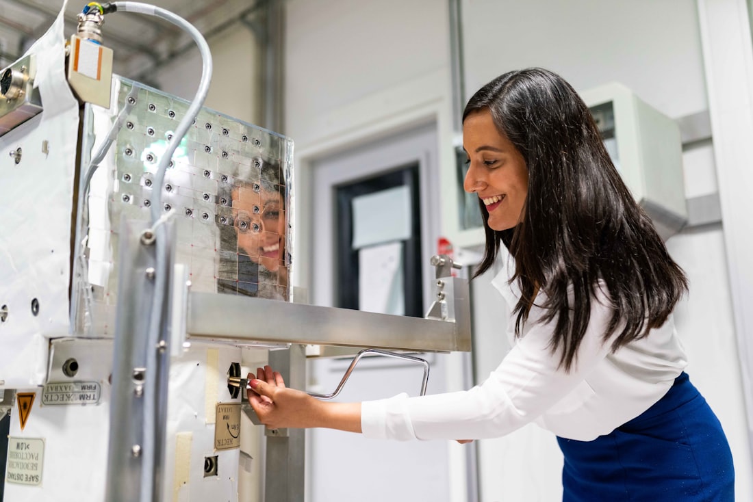 Engineer testing equipment on a laboratory rig